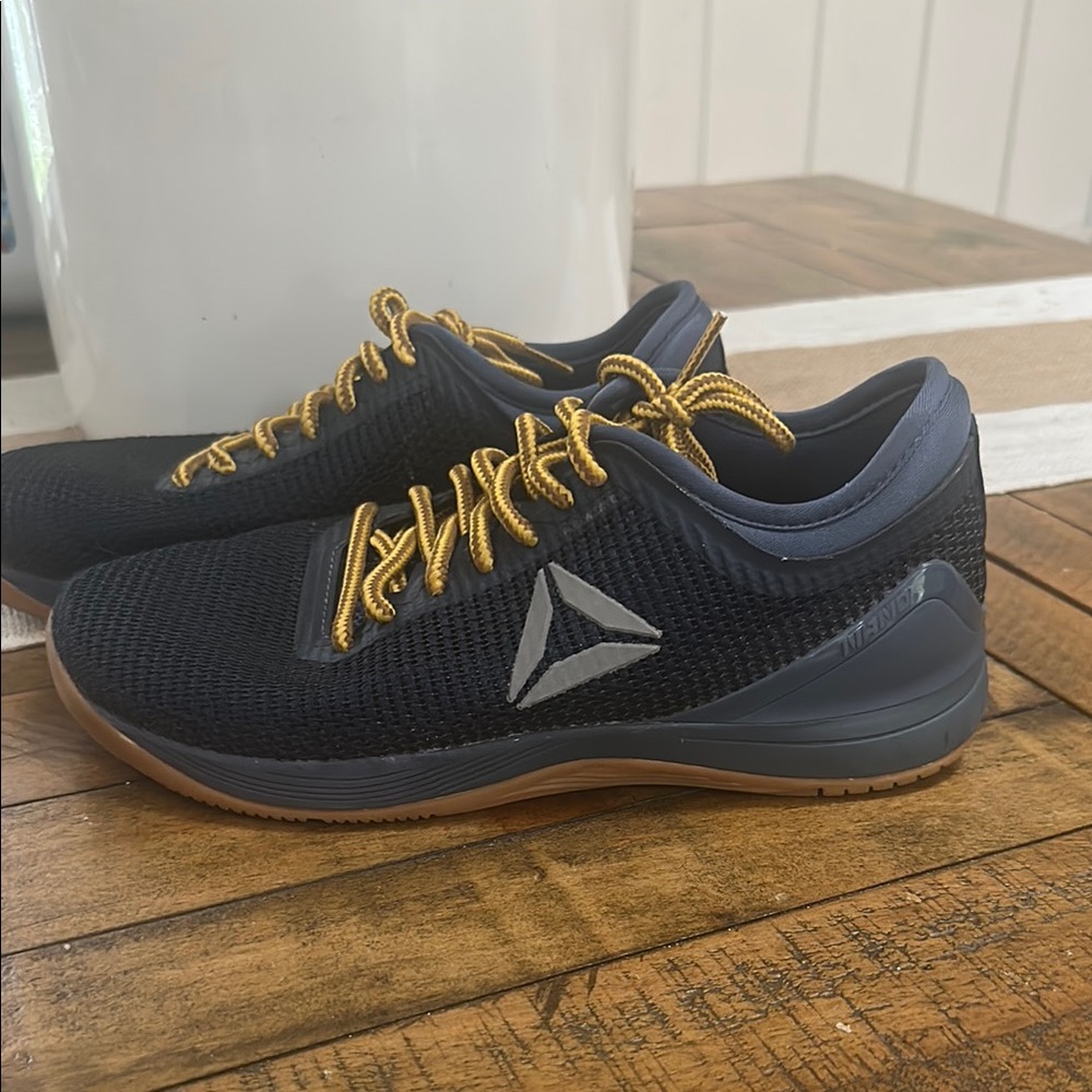 Reebok Black and Gold Athletic Training Shoes